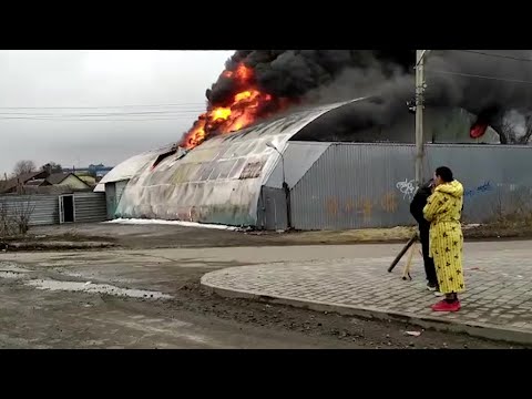 Kharkiv buildings set ablaze by Russian airstrikes | AFP