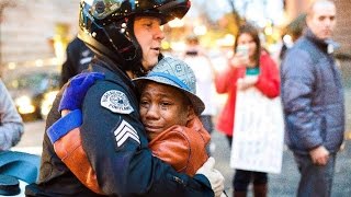 Police Officer Hugs A Young Boy In Ferguson – Finally Some Peace