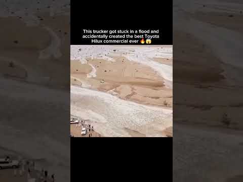 This trucker got stuck in a flood and accidentally created the best Toyota Hilux commercial ever 🔥😱