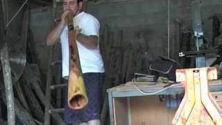 yidaki vibes didgeridoo F with f horn brown bloodwood with ngemba Elder portrait
