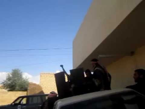 التصدي للطيران المروحي بالدوشكا من قبل كتيبة عائشة أم المؤمنين في رأس العين في الحسكة