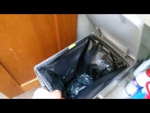 Self opening garbage bin
