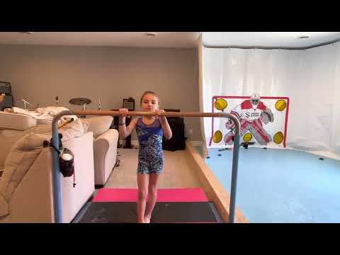 Beginner skills on a gymnastics bar with Kiera