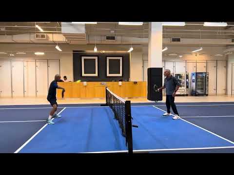 Speed volley drill with 73 year old pickleball player. He has pretty fast hands.