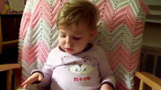 Eden "reads" Goodnight Moon