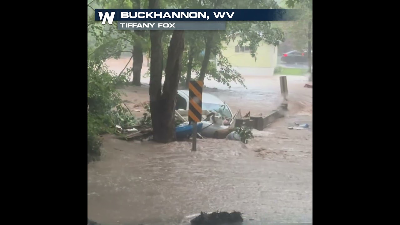 Car swept beneath bridge during Buckhannon, West Virginia flooding