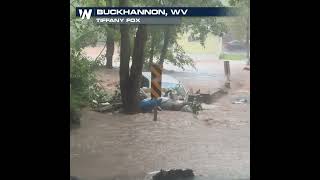 Car swept beneath bridge during Buckhannon, West Virginia flooding