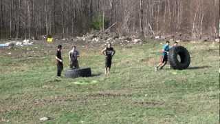 preview picture of video 'Tire flip at the Camp Larga Mud Run, Charleston, Maine'