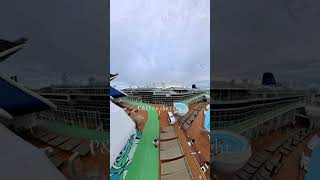 Celebrity Apex in the Caribbean, docked alongside Royal Caribbean and a P&O