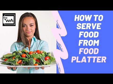 Part of a video titled Part 3- Serving from a food platter with spoon and fork! Waiter training ...