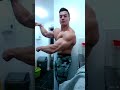 old school bodybuilder posing