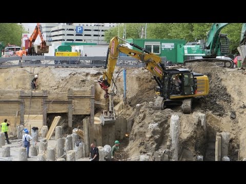 Soeren66 - Bagger CATERPILLAR 316E bei Baggerarbeiten in einer Baugrube