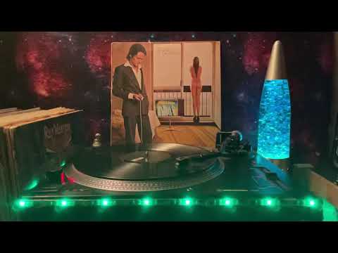 Videoclip de Work To Make It Work — Robert Palmer