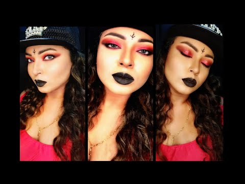 Bold red smokey eyes with black lips ...