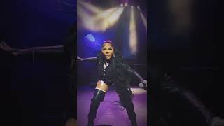 Lil Kim rocked The Apollo wearing all Chanel : a $4,000 swimsuit, belt &amp; $3,301 boots.  #lilkim