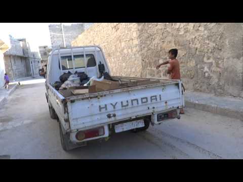 توزيع المعونات الإغاثية في حي طريق الباب في محافظة حلب من قبل لواء عمرو بن العاص