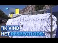 Uniformen failliet ziekenhuis te koop op Dappermarkt: "Ik vind het respectloos"