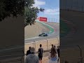 Rally cars drifting the Laguna Seca Corkscrew, amazing save by subaru