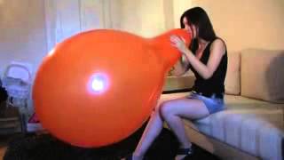 Ann blowing up a 24 inch balloon   new special off