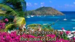Sheltered in the arms of God by  Lynda Randle