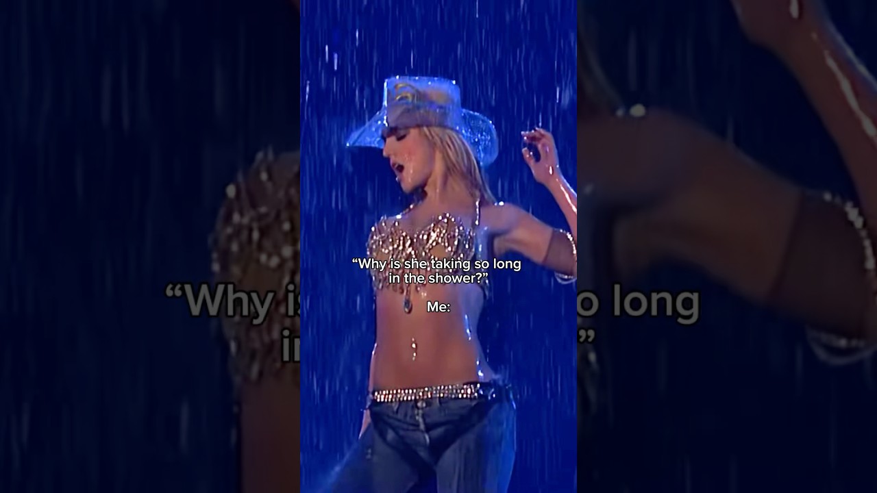 Britney’s Dream Within a Dream tour! The rain, the hat, the bedazzled bra=pure magic #britneyspears