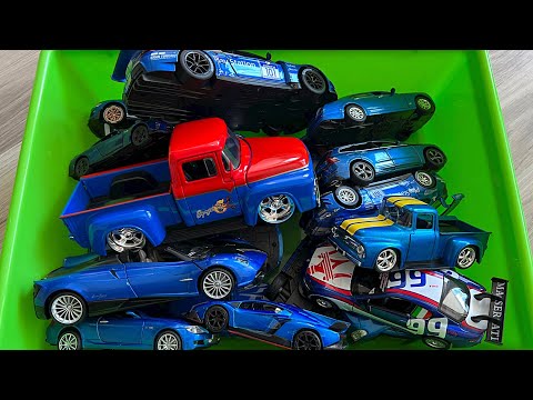 SUVs, Sports, Sedans, Minibuses And Other Diecast Model Cars from A Green Box