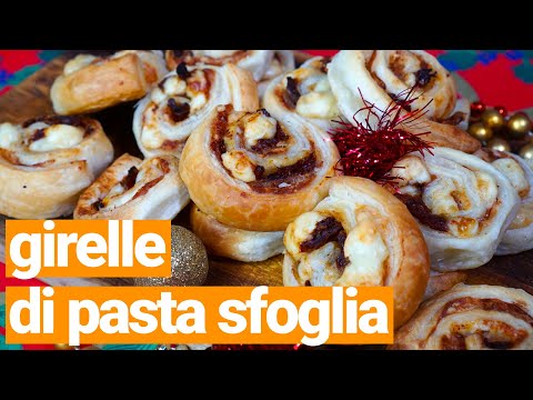 Girelle di pasta sfoglia con pancetta, formaggio e pomodori secchi