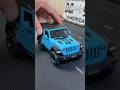 Model of blue Jeep Wrangler Rubicon diecast model car #cars #modelcars #diecast
