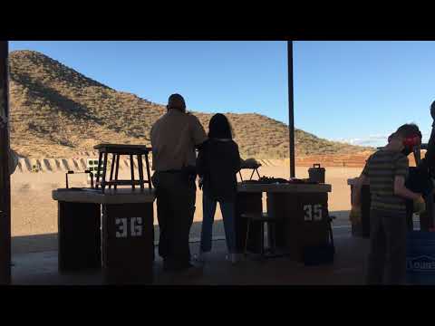 TEENAGE GIRL FIRES BERETTA FOR FIRST TIME AT OUTDOOR GUN SHOOTING RANGE INSTRUCTOR GIVES FREE LESSON