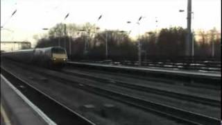 preview picture of video 'Trains at speed on the East Coast Main Line at Huntingdon, Cambridgeshire in February 2007'