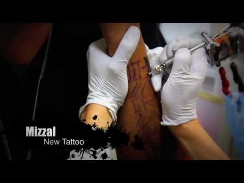 Mizzal in the studio and getting tatted