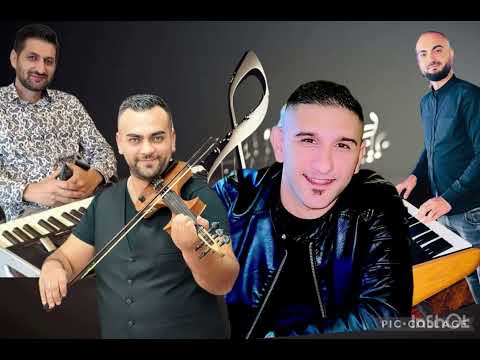 Gelci Xhomllikut-kolazh