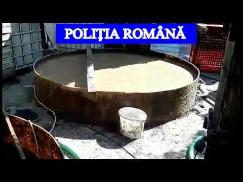 DÂMBOVIȚA: Percheziţii la persoane bănuite de producerea şi comercializarea de alcool