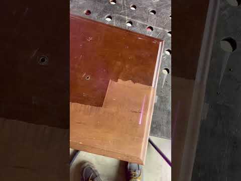 Clean paint on wood using a pulse cleaning machine-ZAC Laser
