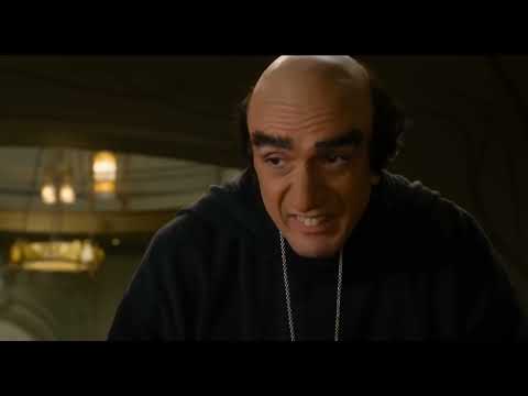 The Smurfs 2 official trailer still: Smurfette, Papa Smurf and friends racing through Paris with Gargamel looming