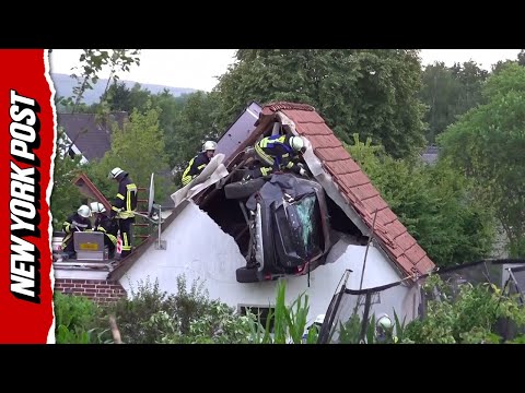 Car crashes through barn roof after plowing through garden