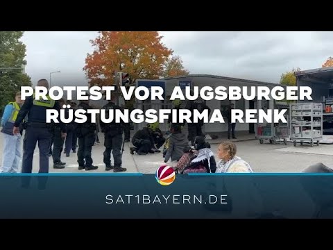 Protestaktion in Augsburg: Aktivisten kleben sich vor Rüstungsfirma Renk fest