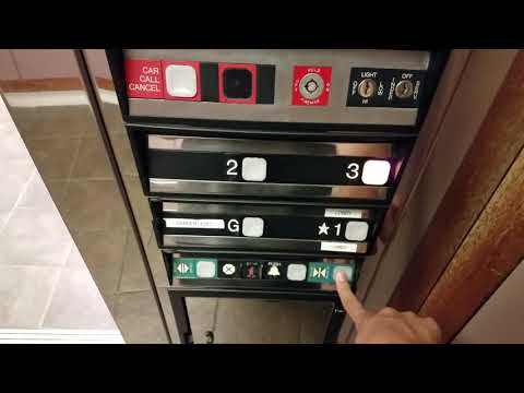 Reflective Dover Impulse Hydraulic Elevator - 9 Washington Street, Hamden, CT