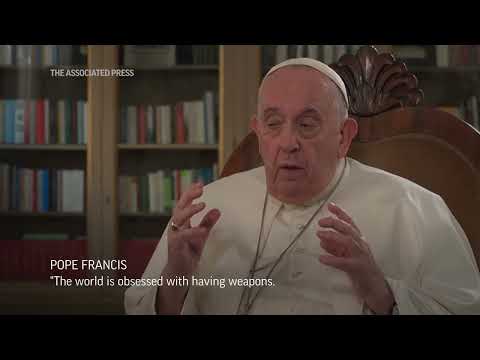 Pope deplores world obsessed with weapons