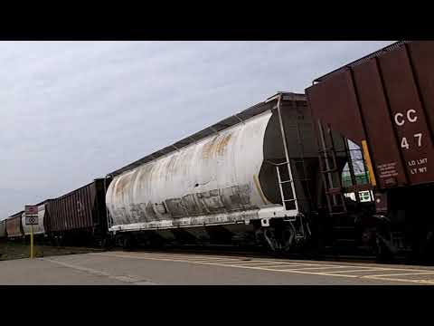 CN G894 w/ CN Engines 5606, 2542 & 2415 lead this 406 axle, EB Loaded Grain train by Georgetown GO
