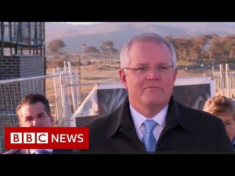 Australian man interrupts PM Morrison to say 'get off my lawn' - BBC News