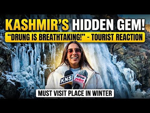 Tourists Thrilled at the Breathtaking Drung Waterfall in Tangmarg Gulmarg.