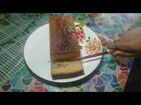 Tooty fruity Pound Cake - cutting the cake clip