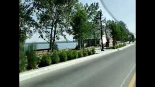 preview picture of video 'Riding  my KLR 650 along beach at Sylvan Lake, Alberta - July 2012'