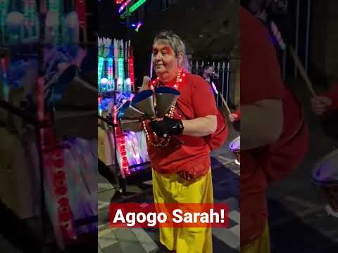 Sarah on the Agogo bell