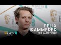 Felix Kammerer Had to Turn Off His Notifications After All Quiet Came Out | EE BAFTAs Red Carpet
