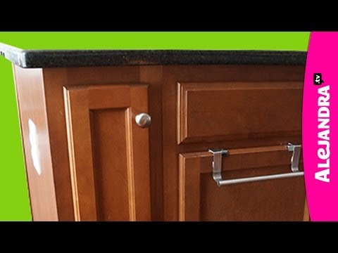 Part of a video titled How to Organize a Narrow Kitchen Cabinet - YouTube