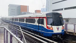 BTS Skytrain in Bangkok. Heavy Rain.