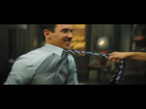 From Paris with Love trailer frame showing car chase through Paris streets