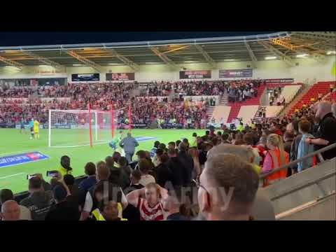 Crewe's Max Stryjek Thows Doncaster Penalty Cheat Sheet Water Bottle Into Crowd (Credit: Iron Army).
